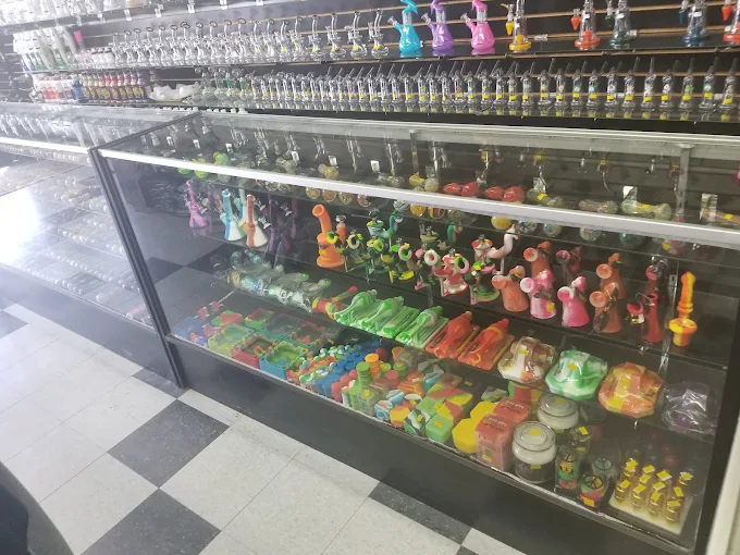 The counter and shelves inside Ameer Smoke Shop