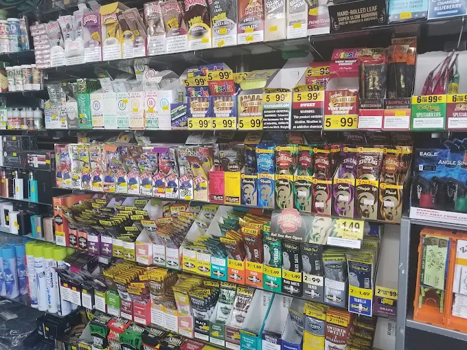 Shelf of stock inside Ameer Smoke Shop