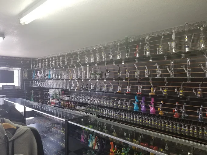 Glass pipes on the shelf at Ameer Smoke Shop